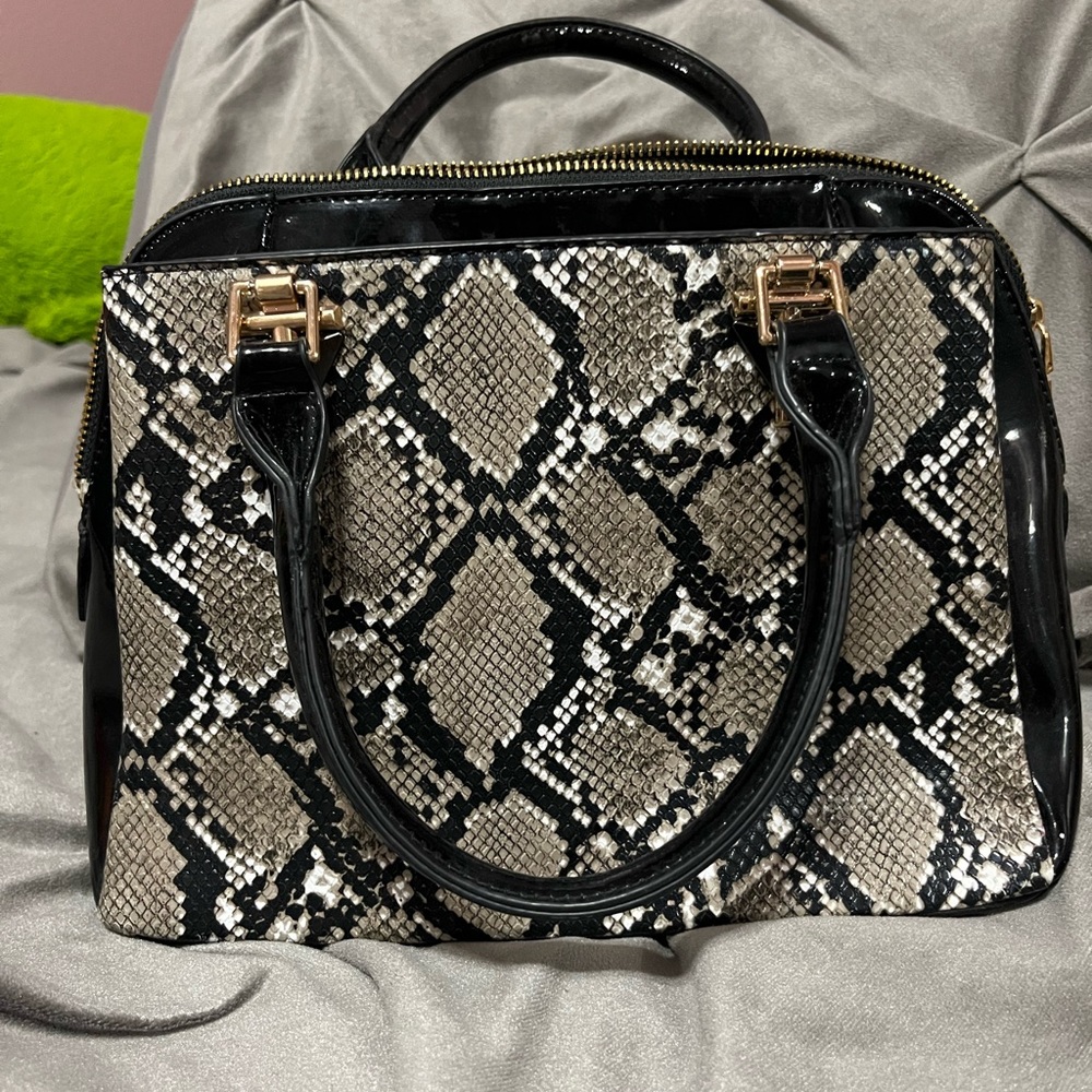 Black snake purse.